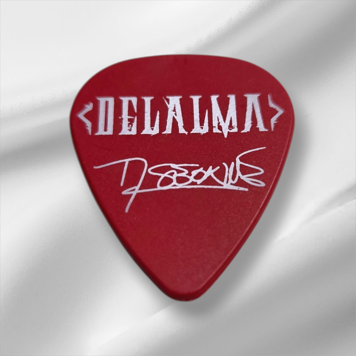 Púa roja "Delalma".
